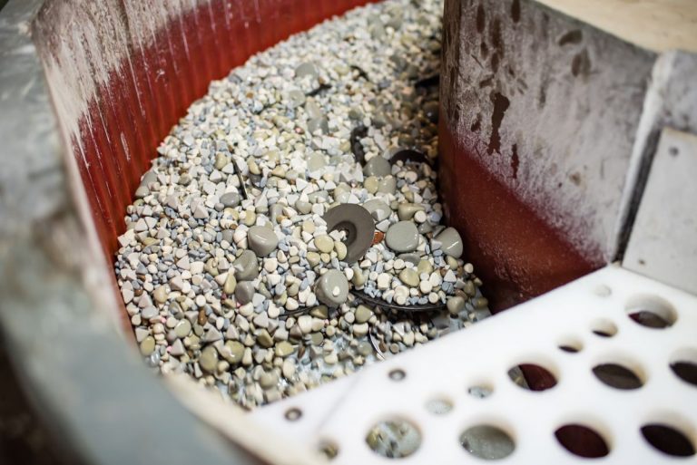 Vibratory Tumbler with parts being processed